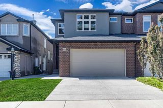 Main Photo: 615 27 Avenue NE in Calgary: Winston Heights/Mountview Semi Detached (Half Duplex) for sale : MLS®# A2082870