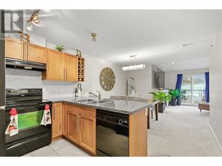 Photo 4: 1089 Sunset Drive Unit# 411 in Kelowna: House for sale : MLS®# 10310637