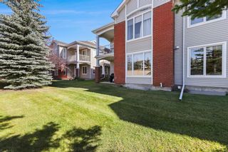 Photo 3: 406 8000 Wentworth Drive SW in Calgary: West Springs Row/Townhouse for sale : MLS®# A2002880