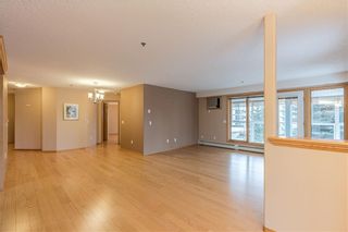 Photo 3: 214 7239 SIERRA MORENA Boulevard SW in Calgary: Signal Hill Apartment for sale : MLS®# C4282554
