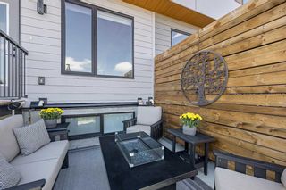 Photo 4: 54 Na'a Heights SW in Calgary: Medicine Hill Row/Townhouse for sale : MLS®# A2131383