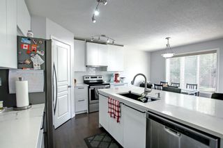 Photo 9: 32 Evansbrooke Rise NW in Calgary: Evanston Detached for sale : MLS®# A1244554