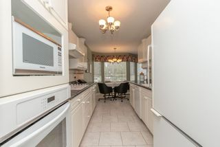 Photo 10: 210 3680 BANFF Court in North Vancouver: Northlands Condo for sale in "Parkgate Manor" : MLS®# R2556634
