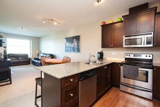 Photo 5: 413 17712 57A Avenue in Surrey: Cloverdale BC Condo for sale in "West on the Village Walk" (Cloverdale)  : MLS®# R2107869