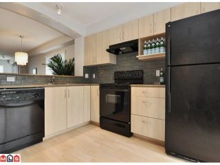 Photo 2: 105 6747 203RD Street in Langley: Willoughby Heights Townhouse for sale in "SAGEBROOK" : MLS®# F1116766