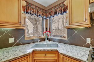 Photo 18: 27 Tuscany Hills Point NW in Calgary: Tuscany Detached for sale : MLS®# A1199731