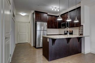 Photo 1: 108 130 Auburn Meadows View SE in Calgary: Auburn Bay Apartment for sale : MLS®# A2126155