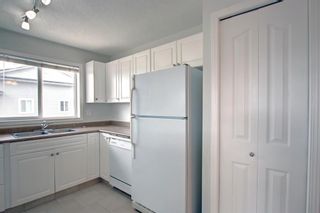 Photo 3: 1414 604 8 Street SW: Airdrie Apartment for sale : MLS®# A1228550