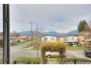 Photo 5: 3102 E 4TH Avenue in Vancouver: Renfrew VE House for sale in "RENFREW" (Vancouver East)  : MLS®# V1106704
