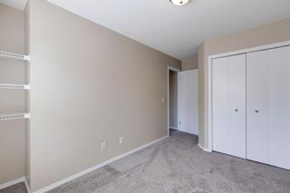 Photo 19: 208 Toscana Gardens NW in Calgary: Tuscany Row/Townhouse for sale : MLS®# A1127708