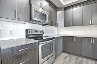 Photo 5: 106 6703 New Brighton Avenue SE in Calgary: New Brighton Apartment for sale : MLS®# A1167531