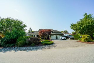 Photo 1: 8034 150 Street in Surrey: Bear Creek Green Timbers House for sale in "Mourningside Estates" : MLS®# R2293254