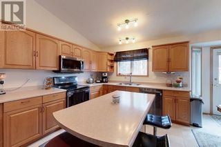 Photo 2: 17 Robertson Way SW in Slave Lake: House for sale : MLS®# A2042633