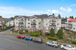 Photo 1: 404 33255 OLD YALE Road in Abbotsford: Central Abbotsford Condo for sale in "The Brixton" : MLS®# R2856482