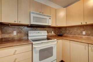 Photo 7: 8423 304 Mackenzie Way SW: Airdrie Apartment for sale : MLS®# A1238271