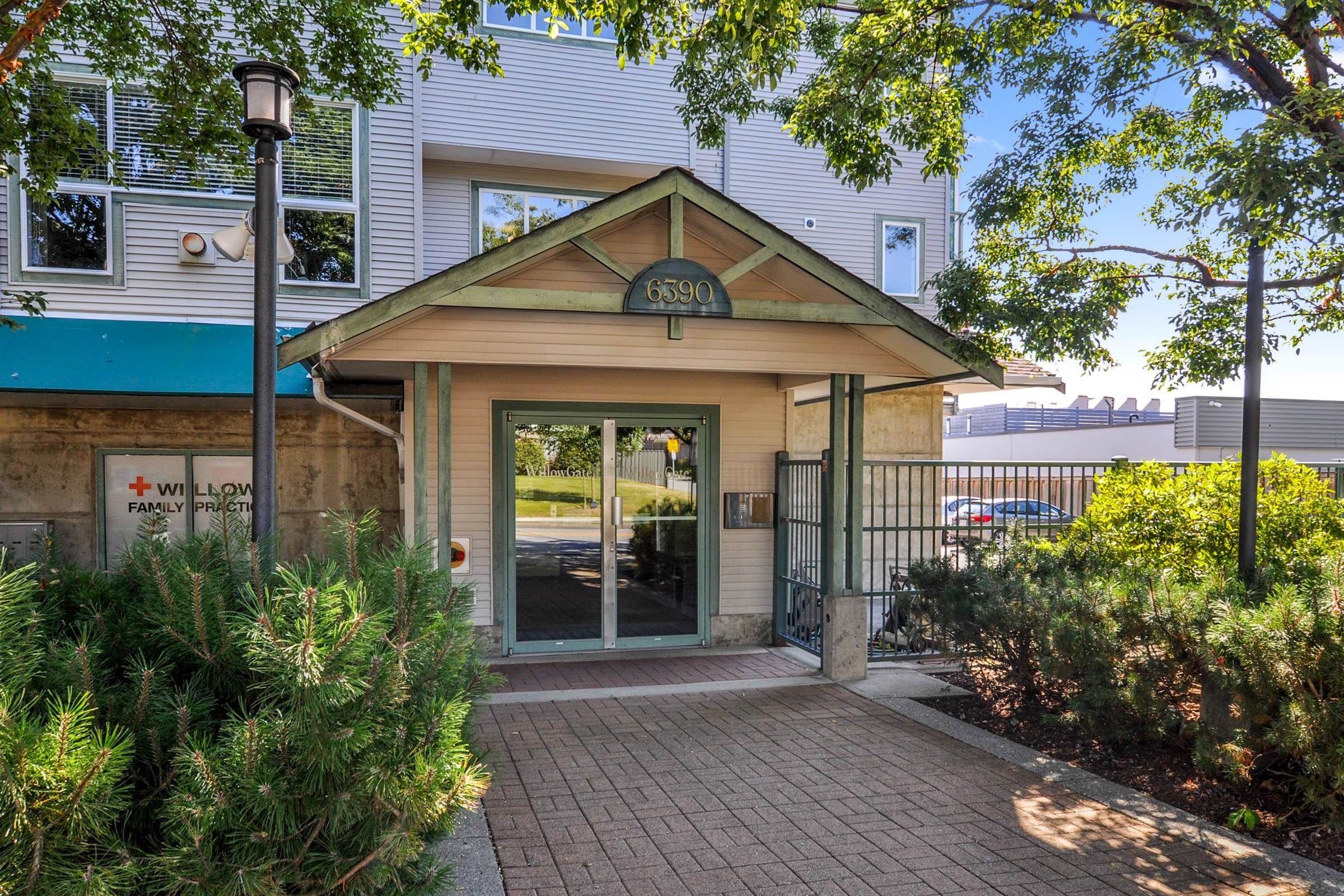 Main Photo: 409 6390 196 Street in Langley: Willoughby Heights Condo for sale in "Willowgate" : MLS®# R2764122