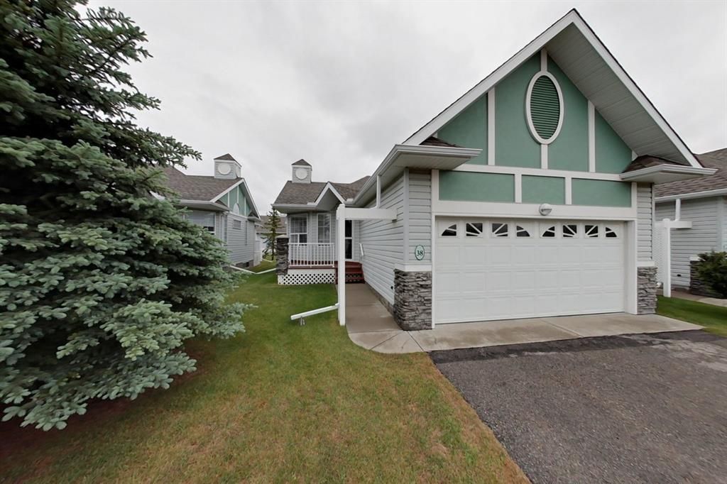 Main Photo: 38 1008 Woodside Way NW: Airdrie Row/Townhouse for sale : MLS®# A1123458