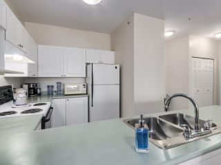 Photo 8: 207 2109 ROWLAND Street in Port Coquitlam: Central Pt Coquitlam Condo for sale in "PARKVIEW PLACE" : MLS®# R2542754