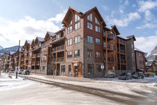 Photo 1: 410 707 Spring Creek Drive: Canmore Apartment for sale : MLS®# A2033193