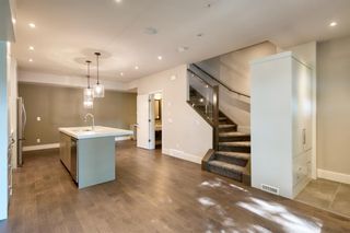 Photo 5: 2 535 33 Street NW in Calgary: Parkdale Row/Townhouse for sale : MLS®# A1255898