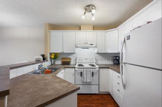 Photo 10: 1220 950 Arbour Lake Road NW in Calgary: Arbour Lake Apartment for sale : MLS®# A2052874