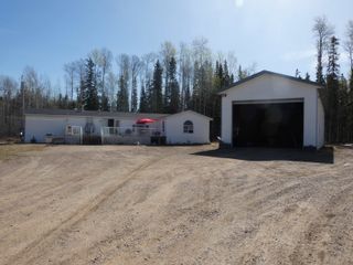 Photo 1: 27 FEDIW Road in Fort Nelson: Fort Nelson -Town Manufactured Home for sale : MLS®# R2774060