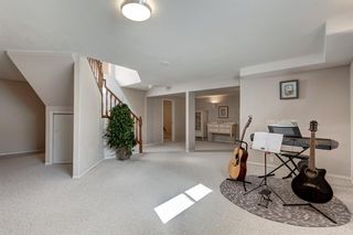 Photo 24: 82 SIENNA PARK Place SW in Calgary: Signal Hill Detached for sale : MLS®# A2043544
