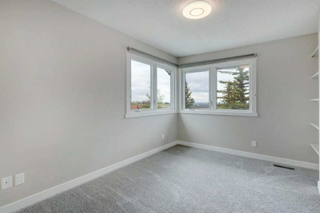 Photo 17: Photos: 227 Edgeland Road NW in Calgary: Edgemont Detached for sale : MLS®# A1236383