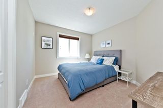 Photo 16: 125 COUGARSTONE Manor SW in Calgary: Cougar Ridge Detached for sale : MLS®# A1019561