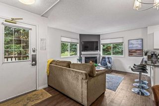 Photo 2: 102 1000 Harvie Heights Road: Harvie Heights Row/Townhouse for sale : MLS®# A2075781