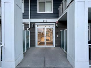 Photo 2: 111 200 Auburn Meadows Common SE in Calgary: Auburn Bay Apartment for sale : MLS®# A1255551