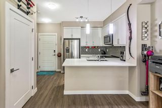 Photo 3: 111 150 Auburn Meadows Manor SE in Calgary: Auburn Bay Apartment for sale : MLS®# A1254330