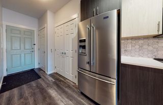 Photo 7: 1105 298 Sage Meadows Park NW in Calgary: Sage Hill Apartment for sale : MLS®# A1246646