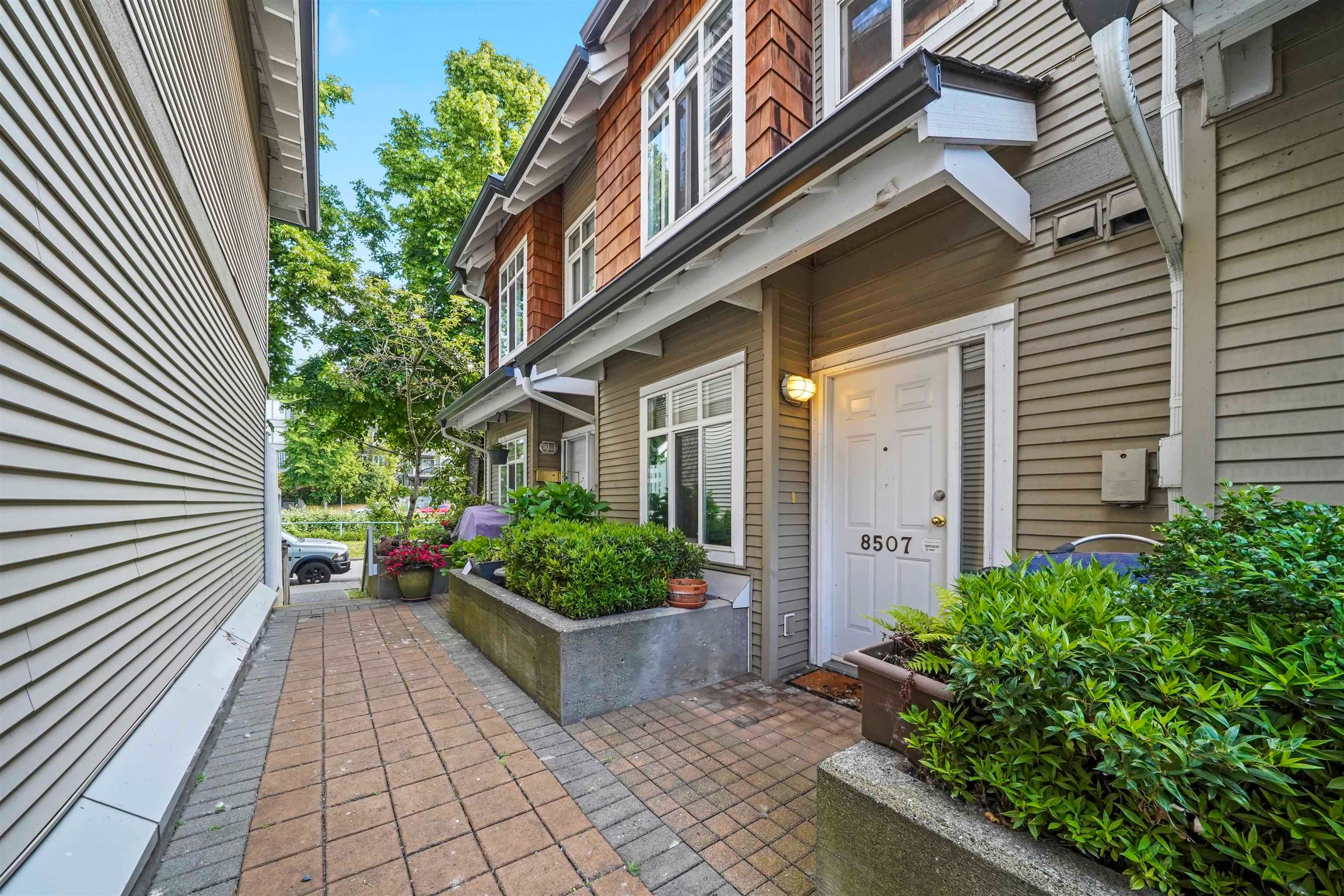 Main Photo: 8507 JELLICOE Street in Vancouver: South Marine Townhouse for sale (Vancouver East)  : MLS®# R2782965