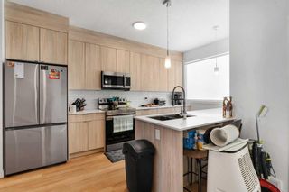 Photo 15: 111 101 Panatella Square in Calgary: Panorama Hills Row/Townhouse for sale : MLS®# A2121247