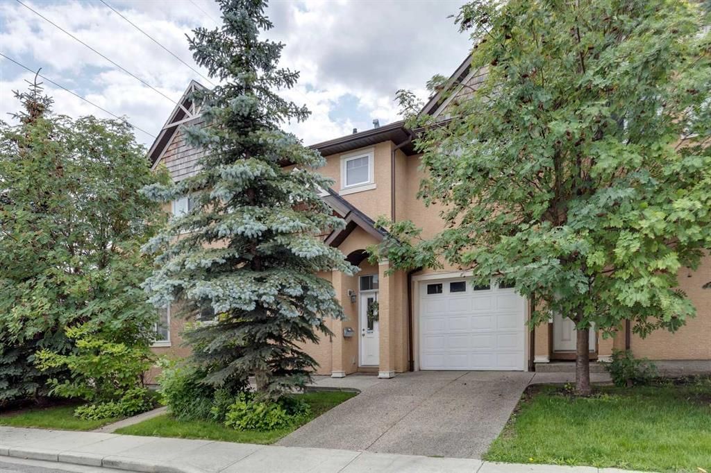 Main Photo: 149 23 Avenue NW in Calgary: Tuxedo Park Row/Townhouse for sale : MLS®# A2067251