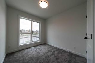 Photo 18: 322 Sovereign Common SW in Calgary: Shaganappi Row/Townhouse for sale : MLS®# A2127197