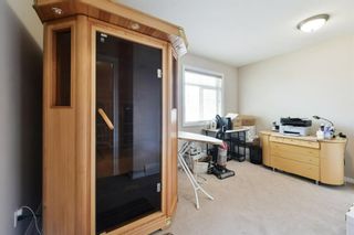 Photo 31: 19 Wentworth Cove SW in Calgary: West Springs Row/Townhouse for sale : MLS®# A1230824