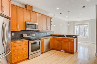 Photo 11: 24 6 Scarpe Drive SW in Calgary: Garrison Woods Row/Townhouse for sale : MLS®# A2041141