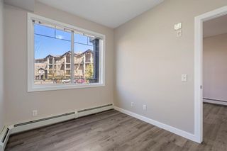 Photo 17: 107 10 Panatella Road NW in Calgary: Panorama Hills Apartment for sale : MLS®# A1199895