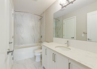 Photo 23: 108 8530 8A Avenue SW in Calgary: West Springs Apartment for sale : MLS®# A2035738
