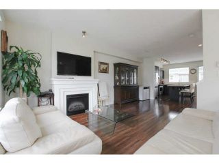 Photo 1: 697 PREMIER Street in North Vancouver: Lynnmour Townhouse for sale in "WEDGEWOOD" : MLS®# V1112919