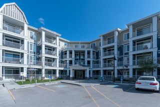 Photo 1: 416 130 Auburn Meadows View SE in Calgary: Auburn Bay Apartment for sale : MLS®# A2044762