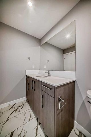 Photo 20: 1307 681 Savanna Boulevard NE in Calgary: Saddle Ridge Apartment for sale : MLS®# A2130904