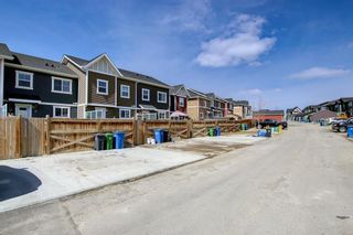 Photo 28: 212 Sunset Road: Cochrane Row/Townhouse for sale : MLS®# A1198532