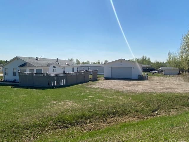 Main Photo: 5531 42 Street in Fort Nelson: Fort Nelson -Town Manufactured Home for sale : MLS®# R2788610