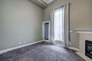 Photo 5: 312 BRIDLEWOOD Lane SW in Calgary: Bridlewood Row/Townhouse for sale : MLS®# A1046866