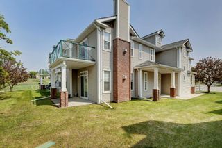 Photo 1: 801 39 Hidden Creek Place NW in Calgary: Hidden Valley Row/Townhouse for sale : MLS®# A2050933