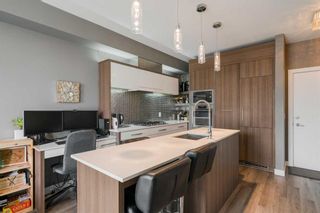 Photo 4: 405 119 19 Street NW in Calgary: West Hillhurst Apartment for sale : MLS®# A2122523