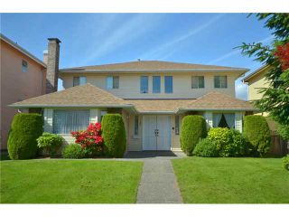 Photo 1: 145 W 45TH Avenue in Vancouver: Oakridge VW House for sale in "OAKRIDGE" (Vancouver West)  : MLS®# V894665